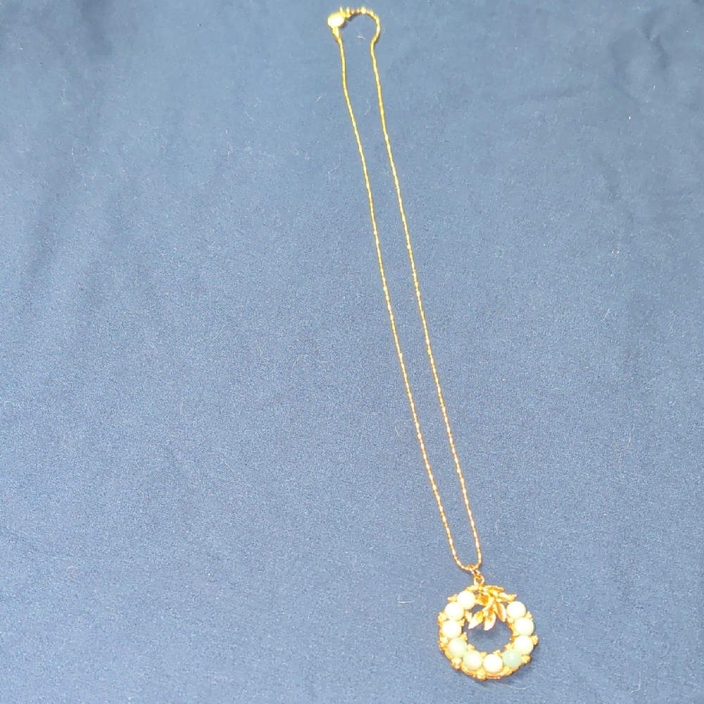 Elegant Gold and Light Blue Pearl Necklace